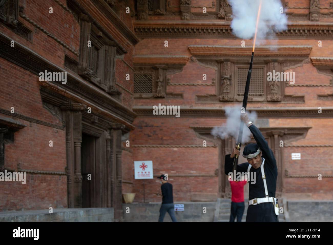 Kathmandu, Nepal. 15th Oct, 2023. A Nepalese Army soldier fires a gun shot during the