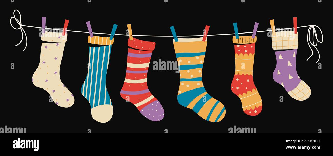 Set of children's socks on a rope with colored clothespins. Vector ...