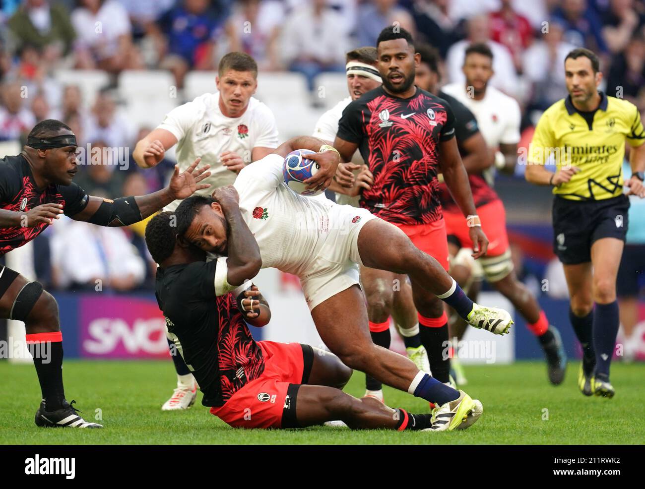 england-s-manu-tuilagi-is-tackled-by-fiji-s-josua-tuisova-during-the