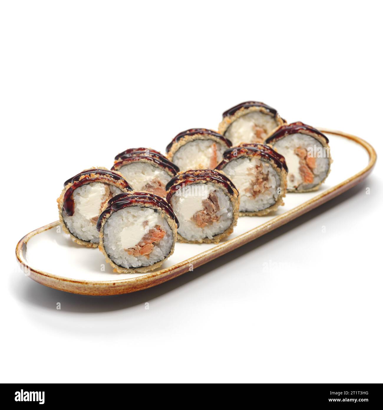 ROLL TEMPURA SAKE YAKI Rice, Nori, Cheese, Teriyaki Salmon, Panko Breadcrumbs. Deepfried sushi