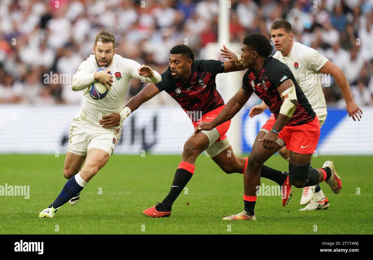 England's Elliot Daly is tackled by Fiji's Ilaisa Droasese during the ...