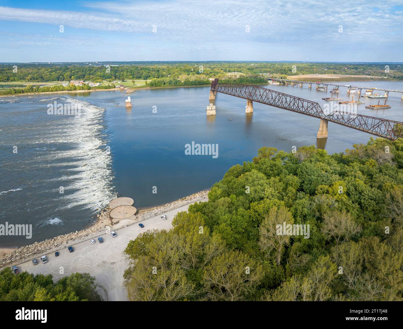 Chain of Rocks on the Mississippi RIver above St Louis with the Low Water Dam, water towers, old historic bridge and the new bridge with construction Stock Photo