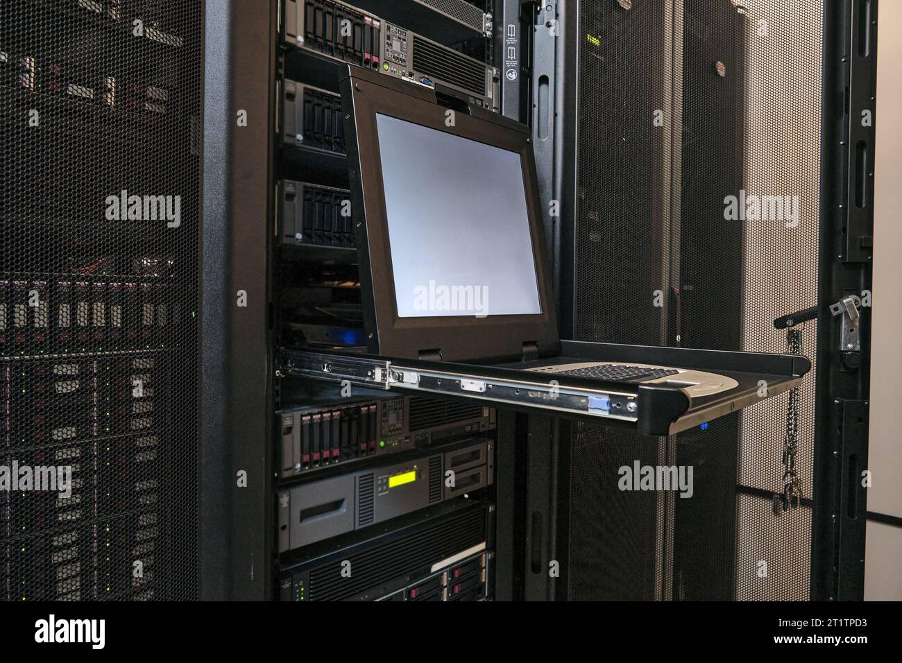 The monitor screen in the server room displays real-time data about the ...
