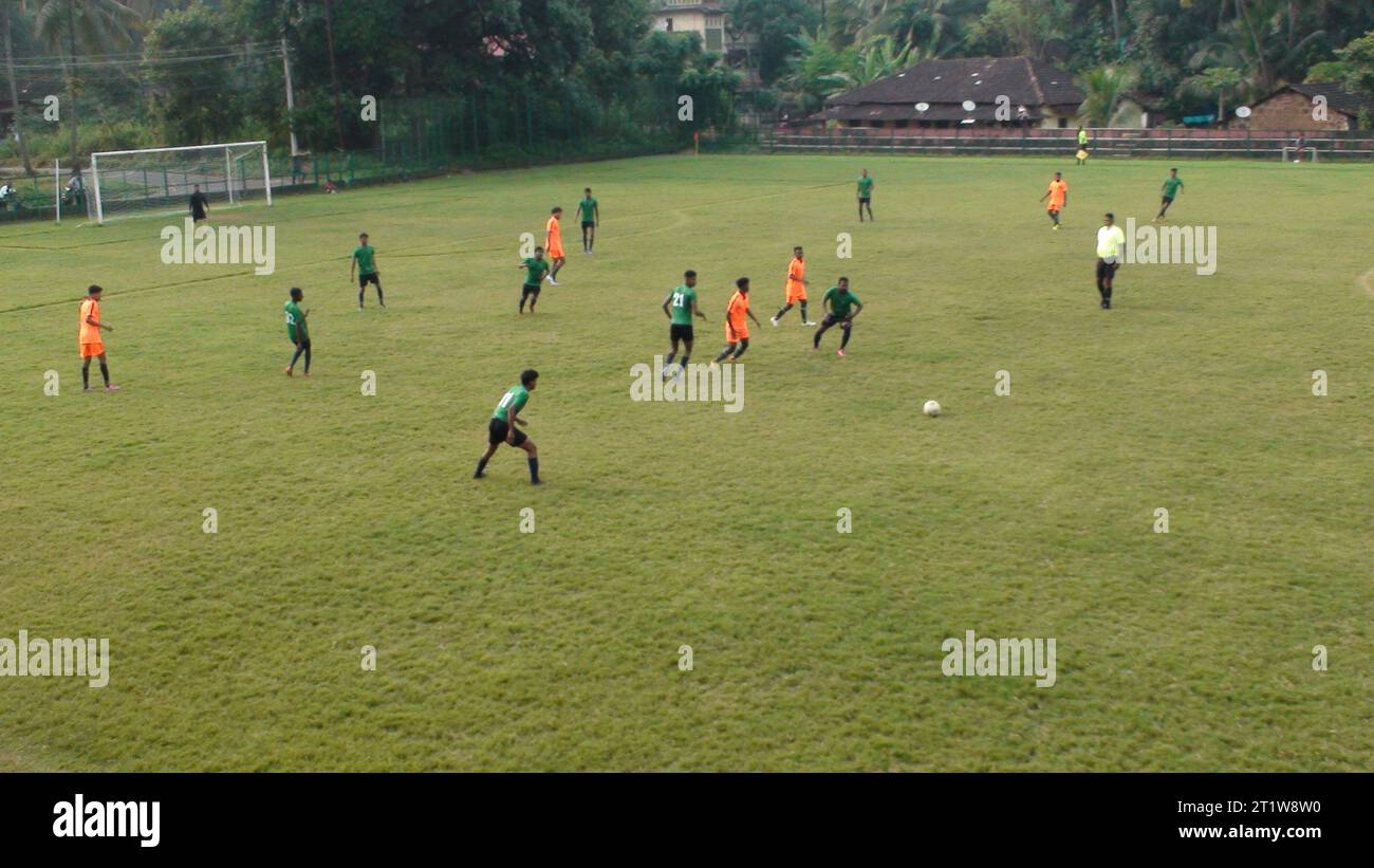 Action from the Goa Football Association Third Division match between Santa Cruz Society of Poitomado and Navelim Sporting at Rosary ground Navelim. Stock Photo