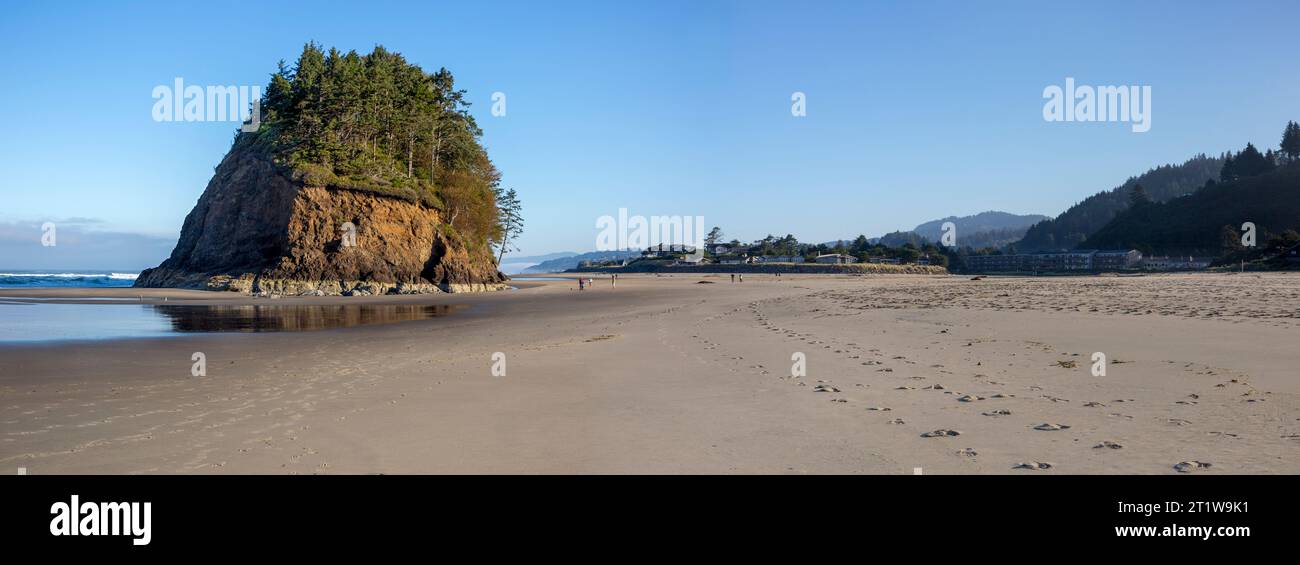Pacific Ocean coastal sea stack Proposal Rock in Tillamook County at Neskowin, Oregon. Proposal Rock was originally called “Schlock” by the Native Ame Stock Photo