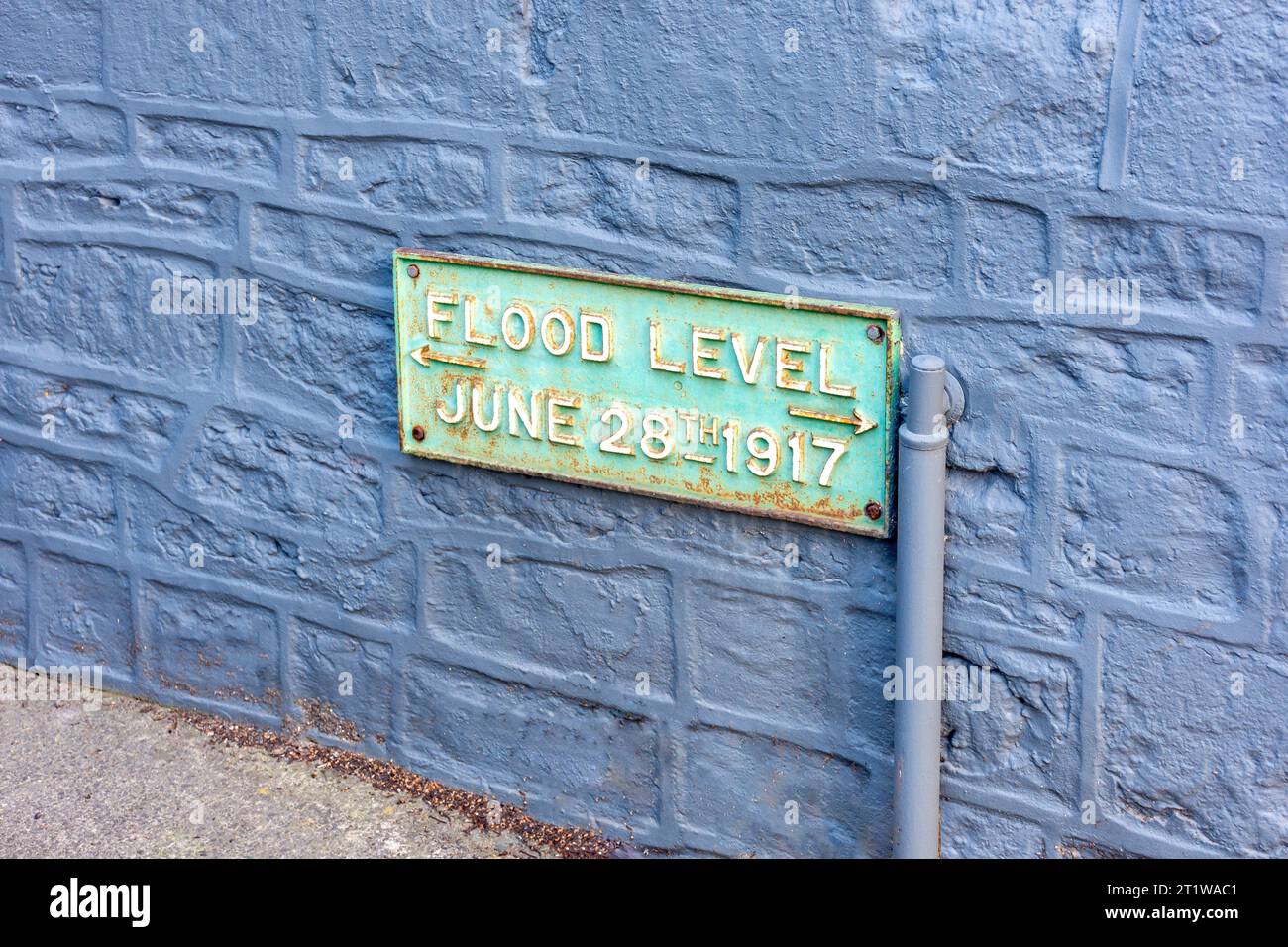 Flood level marker (1917), Patwell Street, Bruton, Somerset, England, United Kingdom Stock Photo