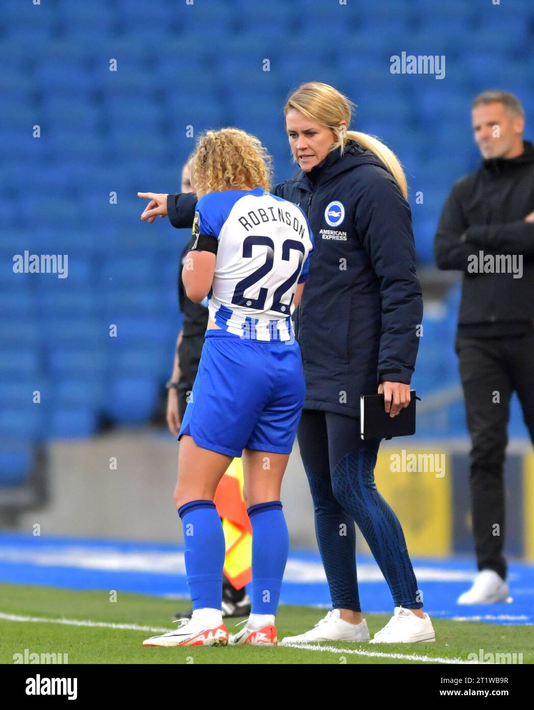 Brighton UK 15th October 2023 -   Brighton head coach Melissa Phillips has a word with Katie Robinson of Brighton during the Barclays  Women's Super League football match between Brighton & Hove Albion and Tottenham Hotspur at The American Express Stadium (Editorial Use Only) : Credit Simon Dack /TPI/ Alamy Live News Stock Photo