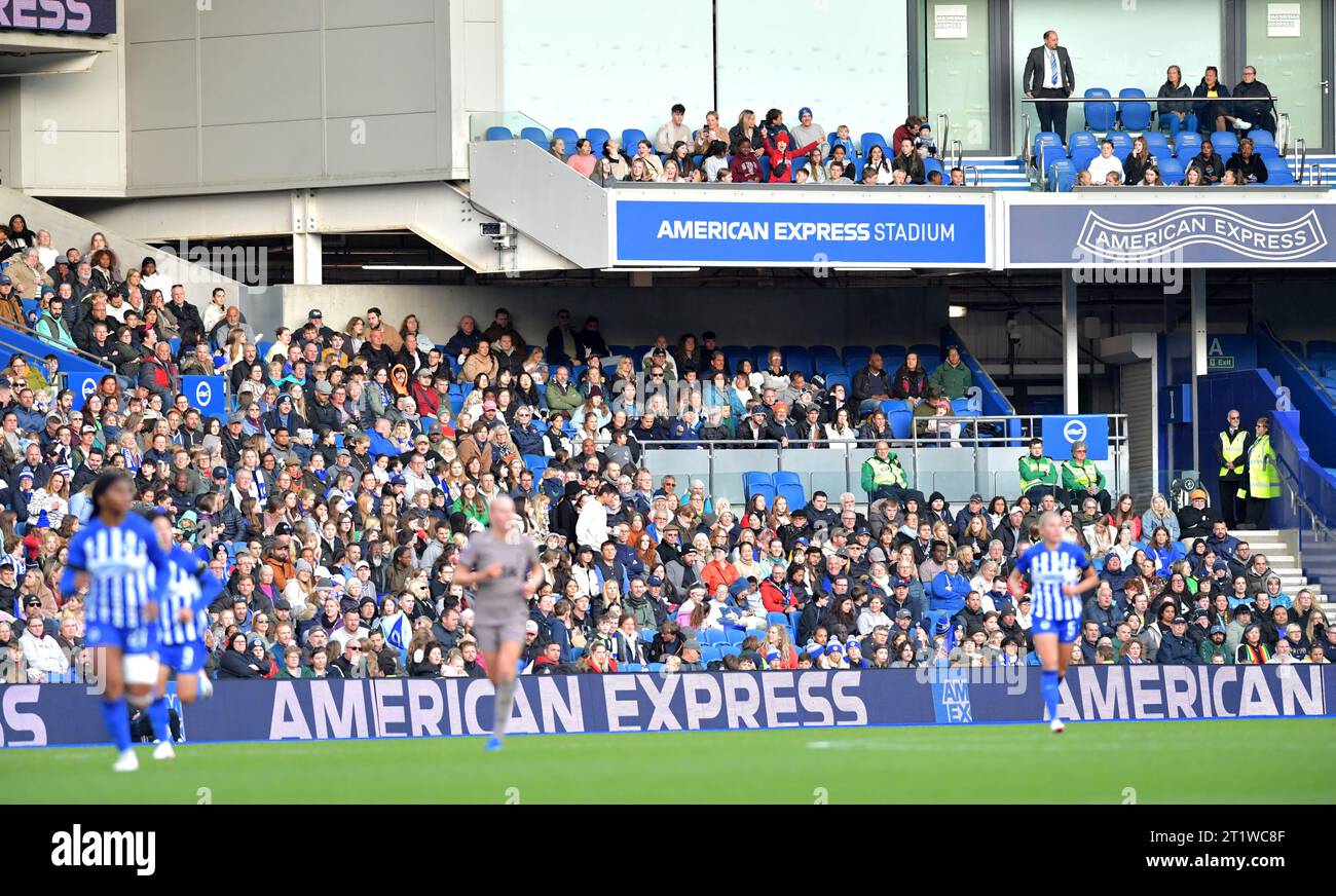 Brighton UK 15th October 2023 -  The crowd watching  the Barclays  Women's Super League football match between Brighton & Hove Albion and Tottenham Hotspur at The American Express Stadium (Editorial Use Only) : Credit Simon Dack /TPI/ Alamy Live News Stock Photo