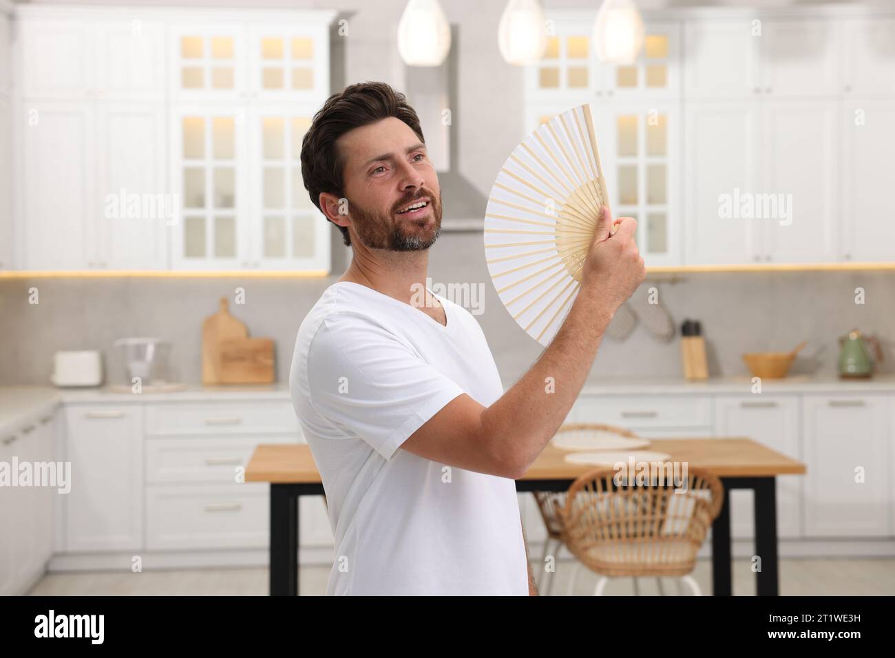 Bearded man hand fan hi-res stock photography and images - Alamy
