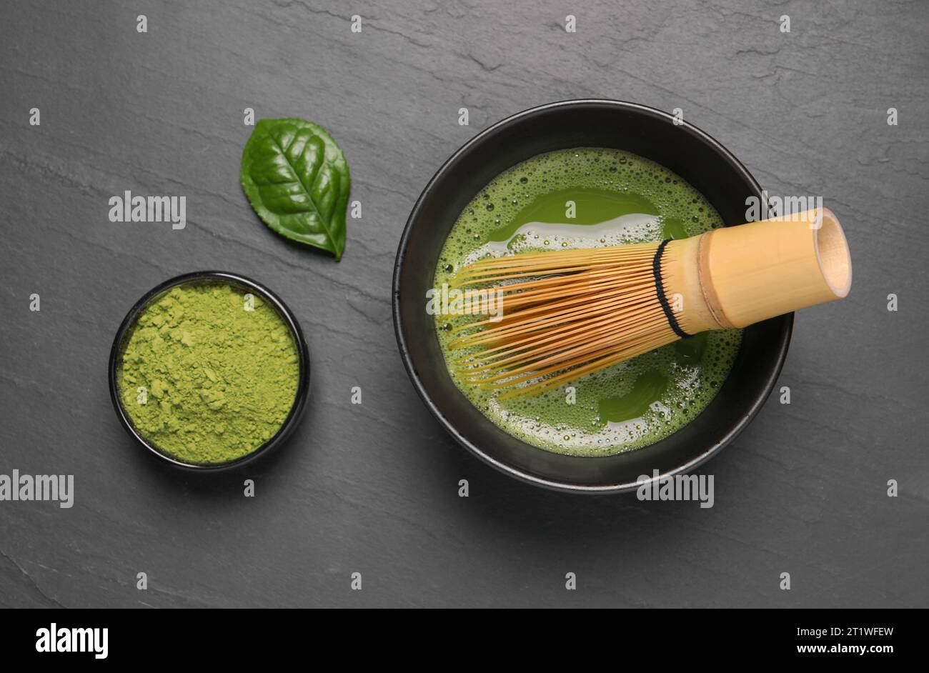 Flat lay composition with matcha tea on gray table Stock Photo