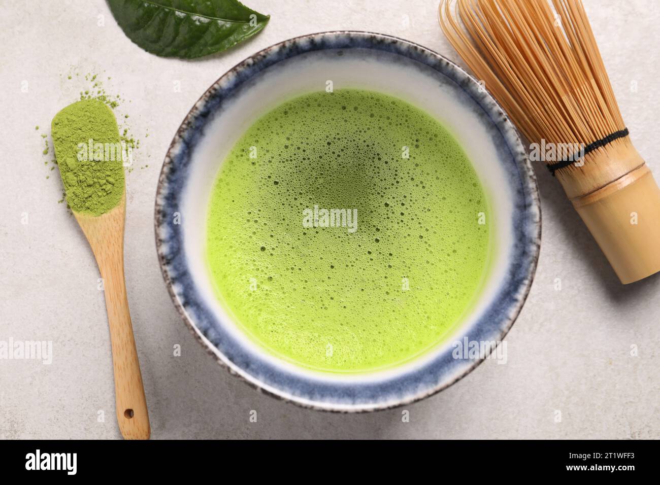 Flat lay composition with matcha tea on light gray table Stock Photo