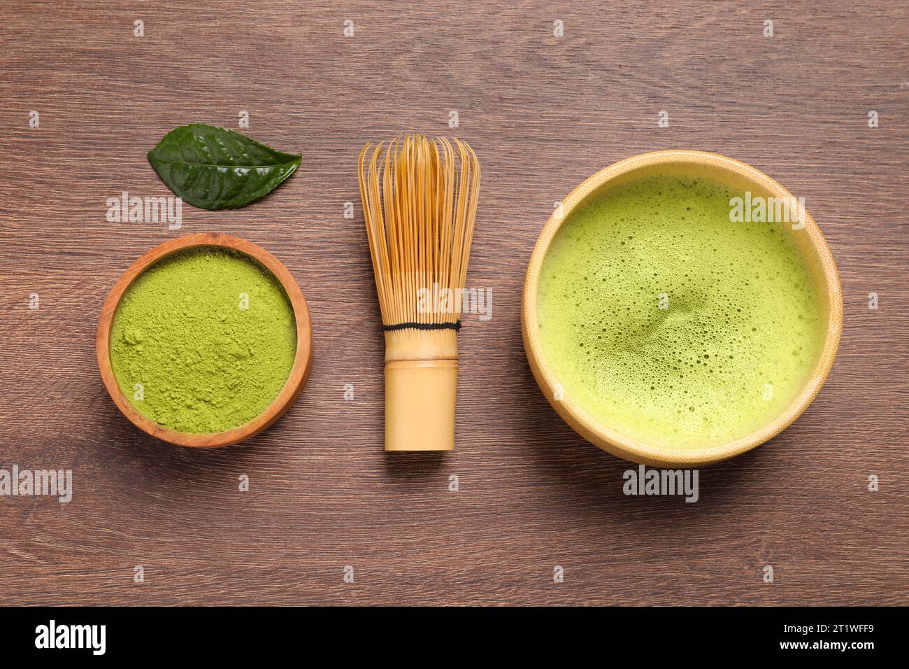 Flat lay composition with matcha tea on wooden table Stock Photo