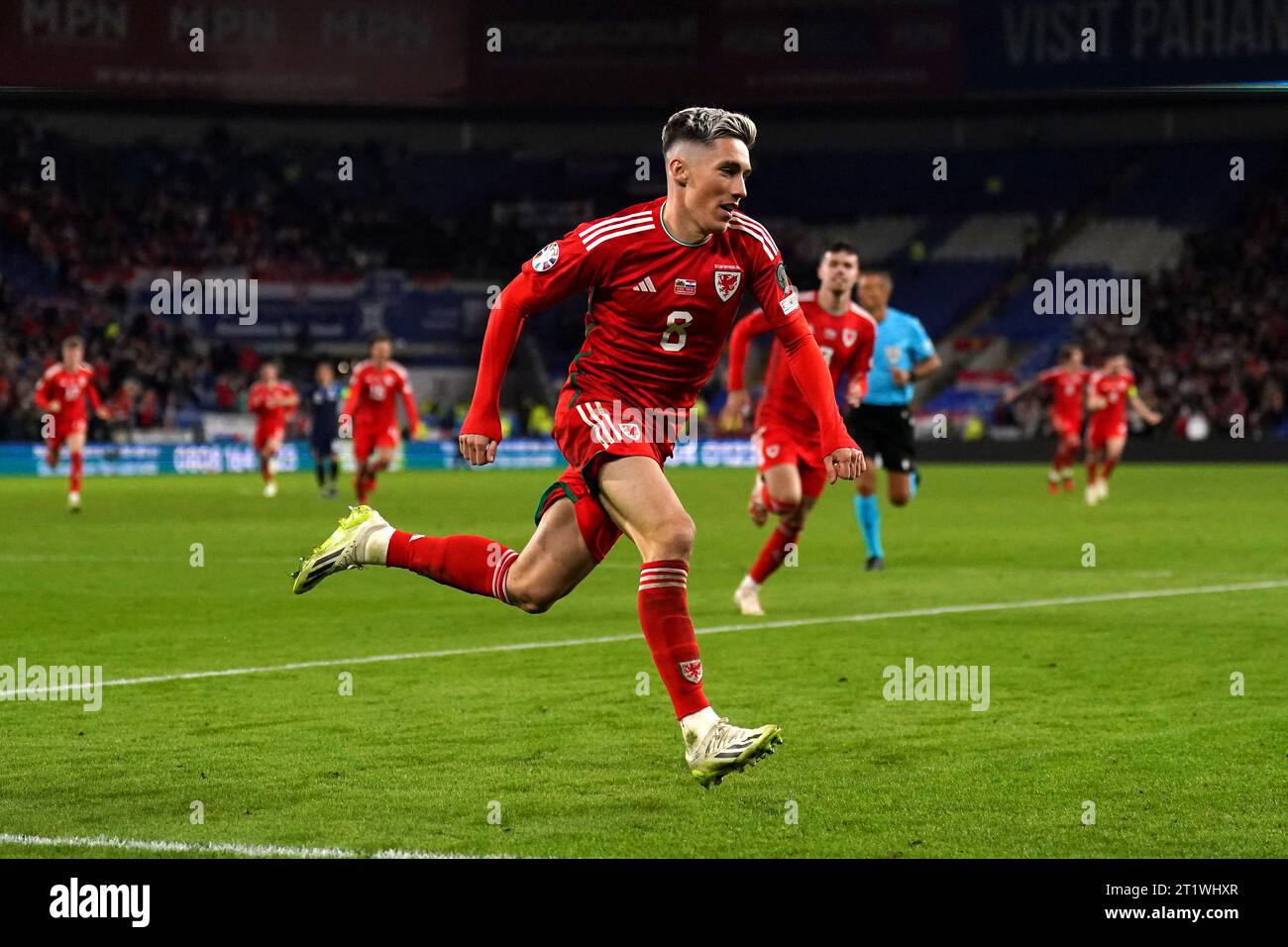 Wales' Harry Wilson celebrates scoring their side's first goal of the game during the UEFA Euro 2024 Qualifying Group D match at the Cardiff City Stadium, Wales. Picture date: Sunday October 15, 2023. Stock Photo