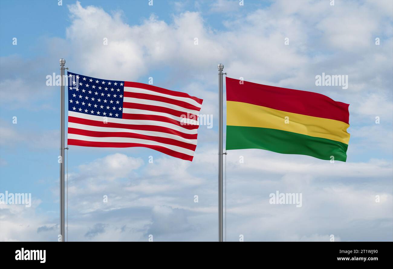 Bolivia and USA flags waving together on blue cloudy sky, two country ...