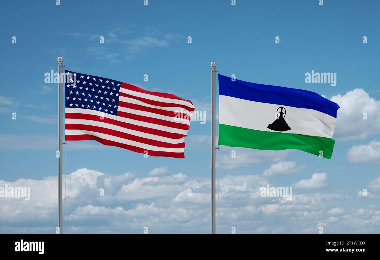 Lesotho and USA flags waving together in the wind on blue cloudy sky ...