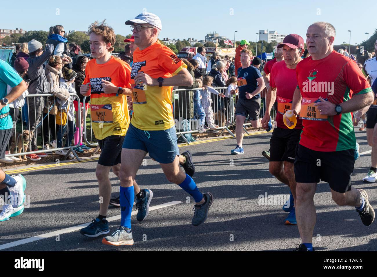 Two men running for campaign against living miserably charity hi-res ...