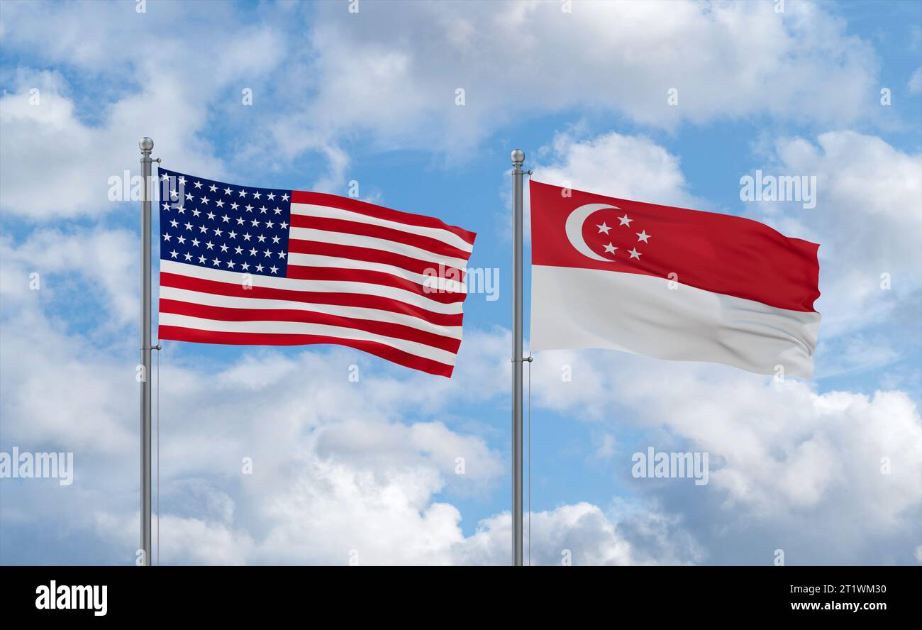 Republic of Singapore and USA flags waving together in the wind on blue ...