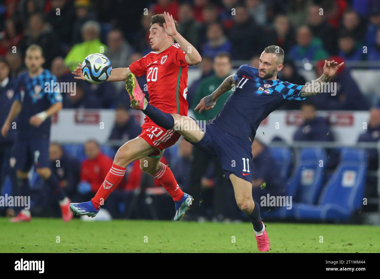 Dan James of Wales and Marcelo Brozović #11 of Croatia battle for the ball during the UEFA Euro 2024 Qualifiers match Wales vs Croatia at Cardiff City Stadium, Cardiff, United Kingdom, 15th October 2023  (Photo by Gareth Evans/News Images) Stock Photo