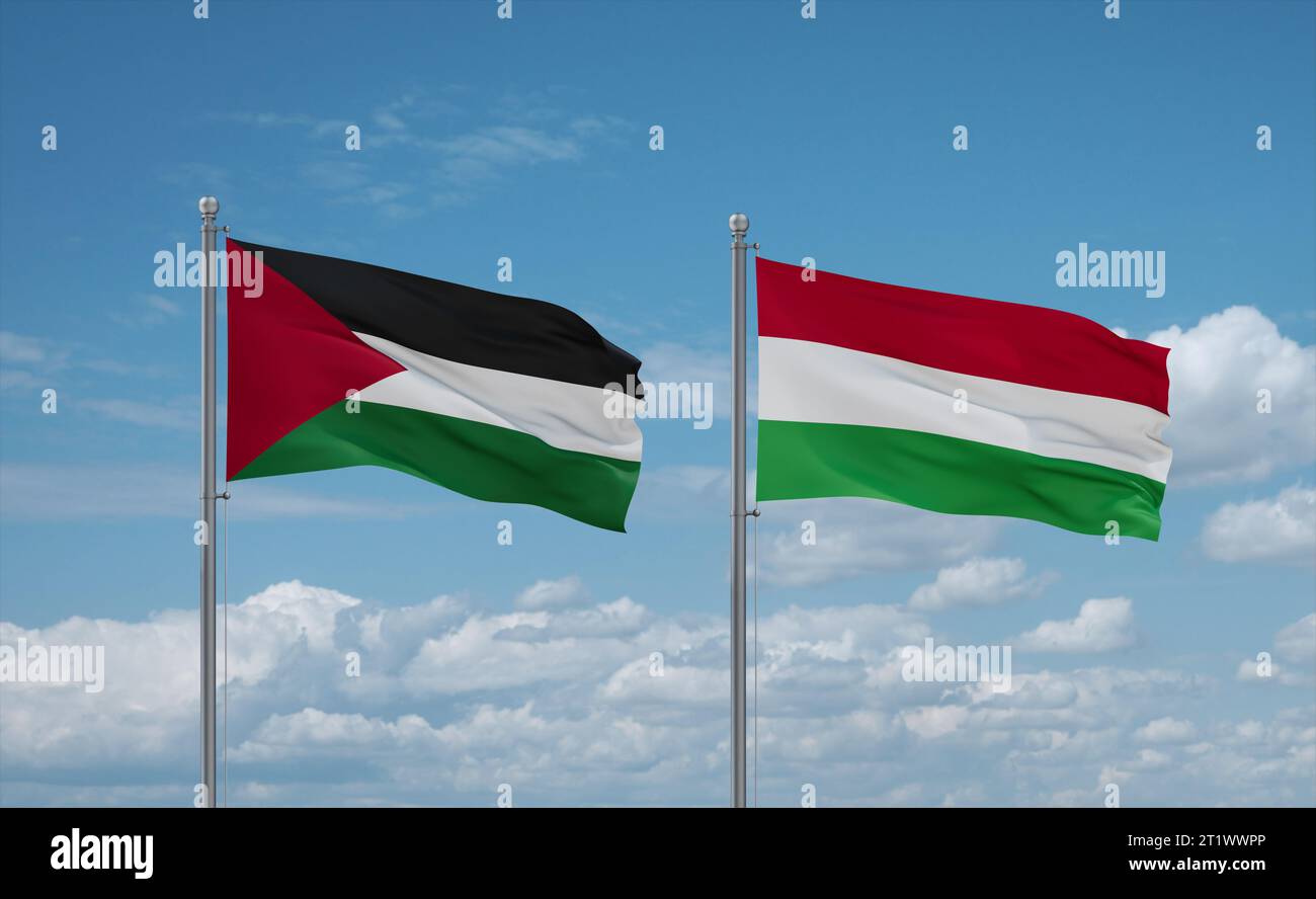 Hungary and Palestine and Gaza Strip flags waving together on blue cloudy sky, two country relationship concept Stock Photo