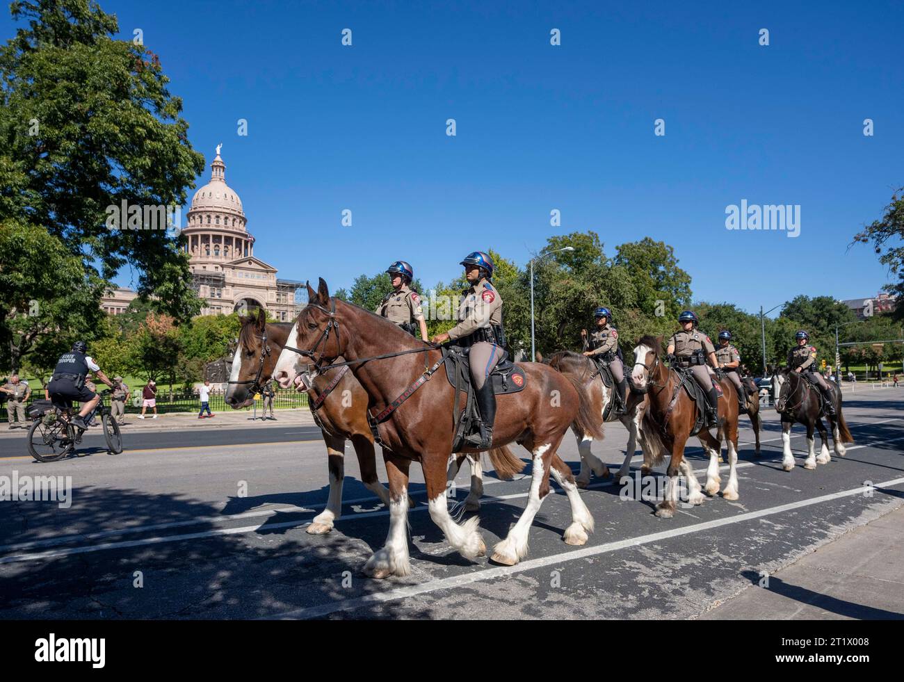 Austin, Texas, USA. October 15, 2023: Texas Department of Public Safety troopers on horseback keep order as 250 people rally during a pro-Palestine march to the Texas Capitol. ©Bob Daemmrich Stock Photo