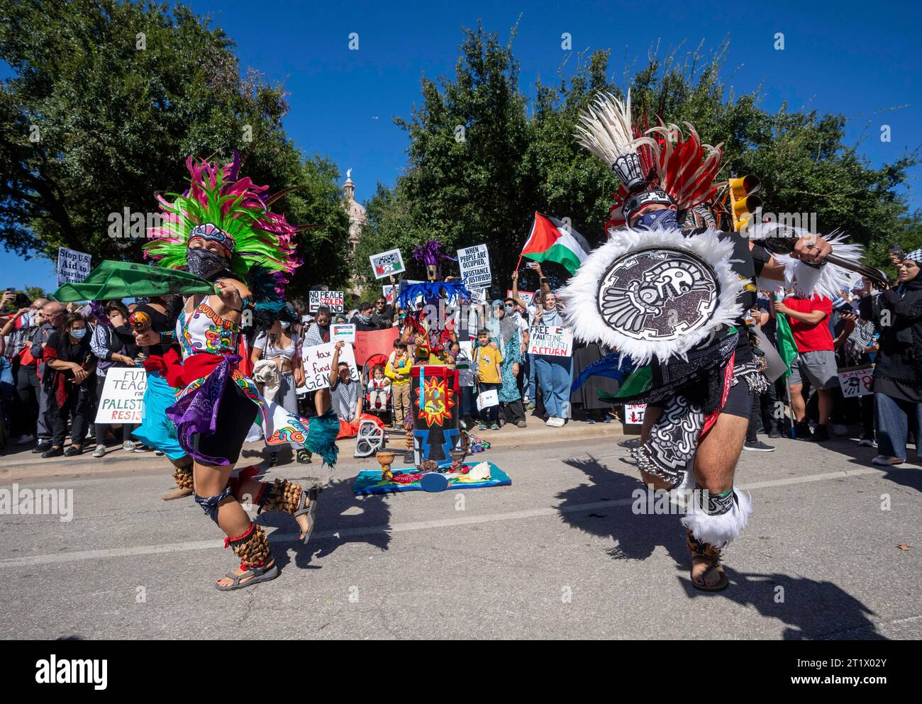 Austin, Texas, USA. October 15, 2023. Azteca dancers from 'Danza Ollinyollotl,' an indigenous group from the University of Texas, perform in front of the Texas Capitol. ©Bob Daemmrich Stock Photo