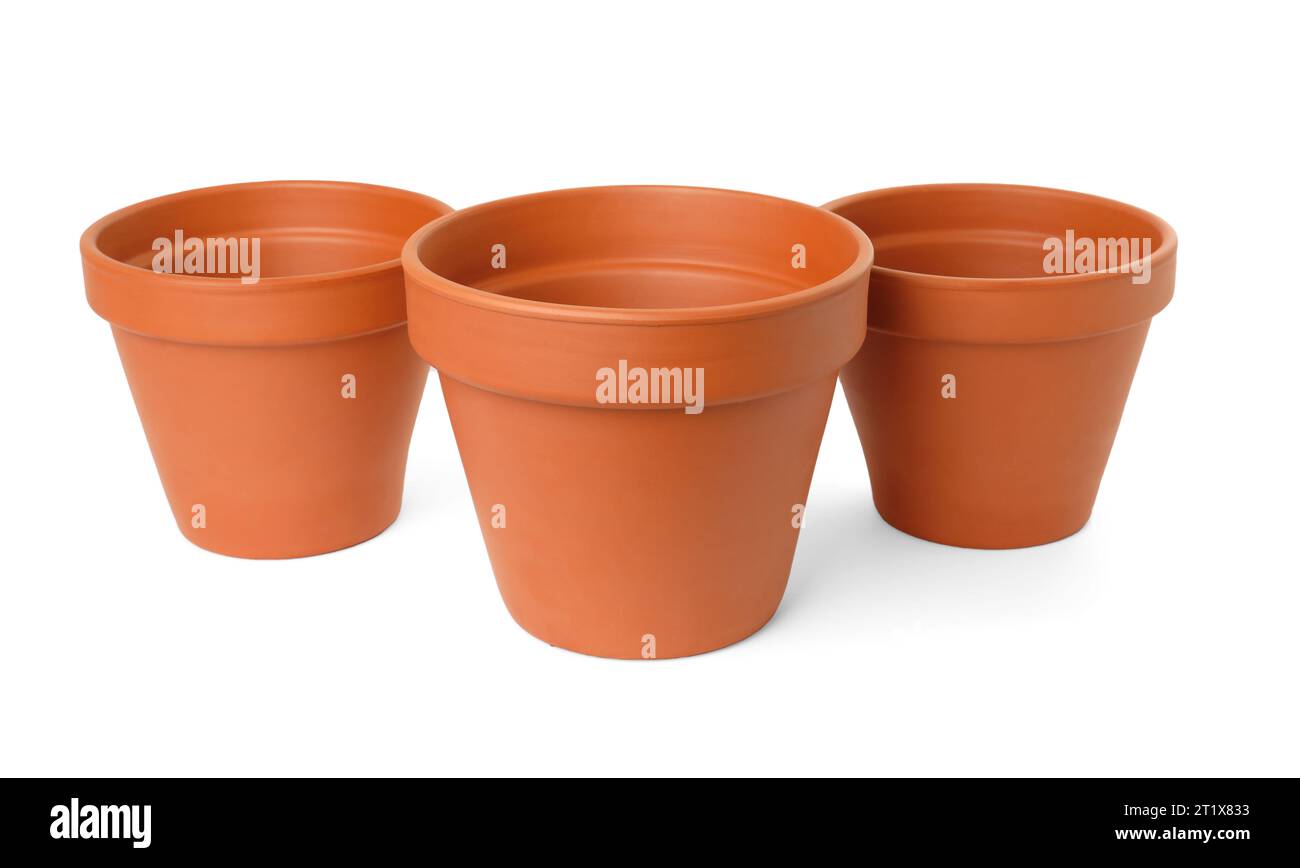 Empty clay flower pots isolated on white Stock Photo - Alamy