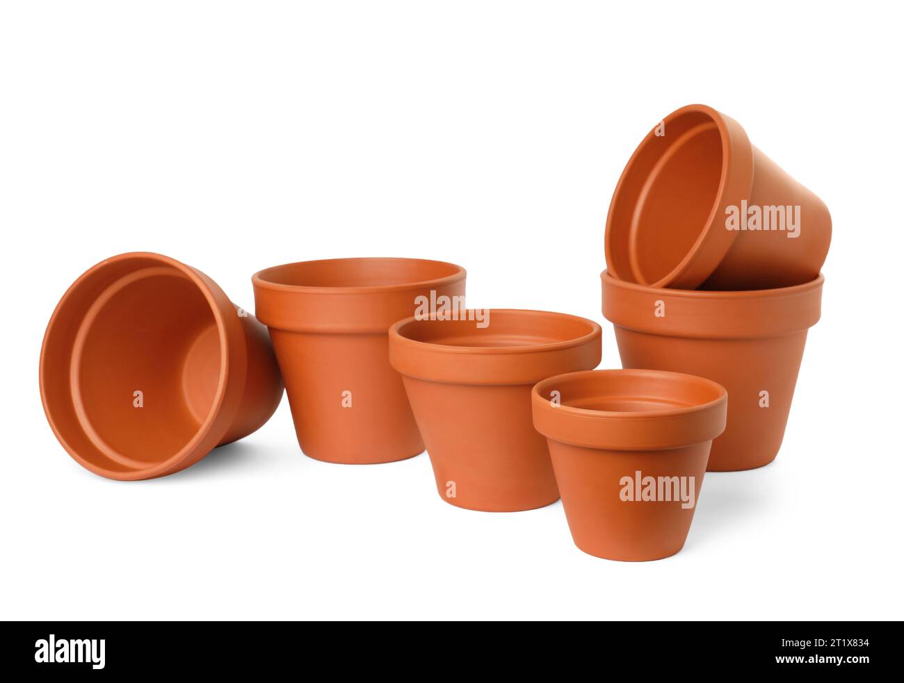 Empty clay flower pots isolated on white Stock Photo - Alamy