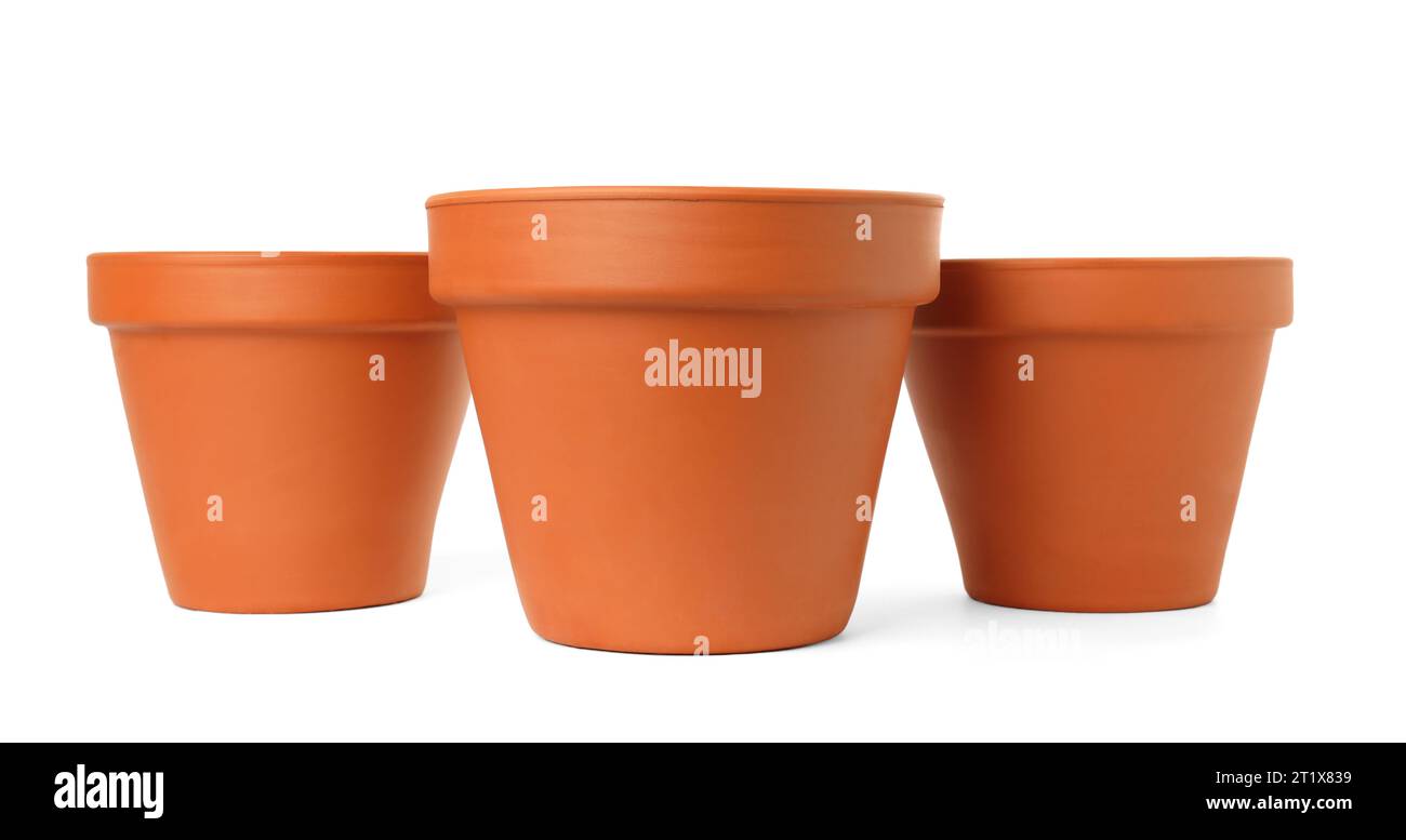 Empty clay flower pots isolated on white Stock Photo - Alamy