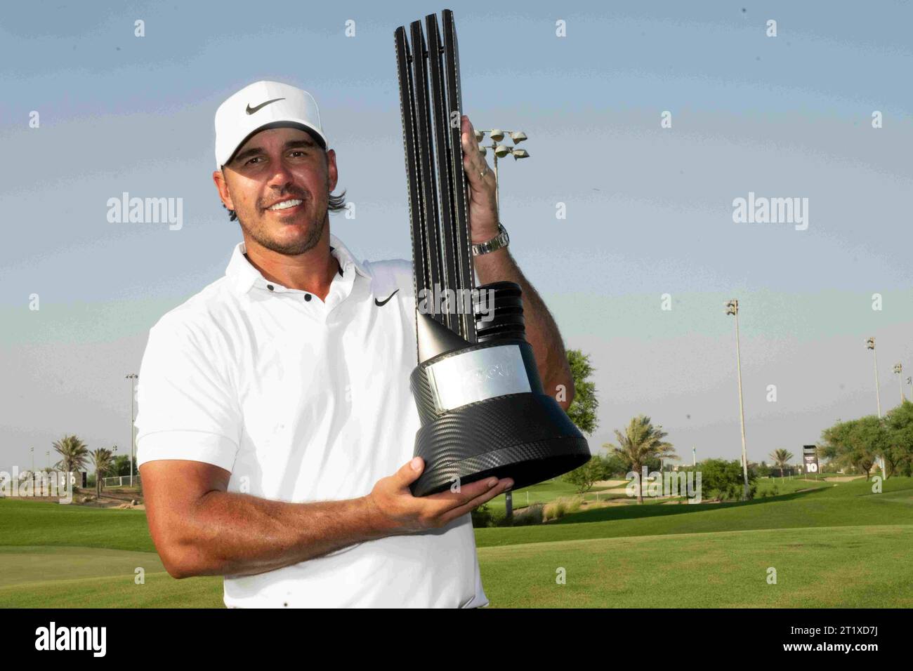 (231016) -- JEDDAH, Oct. 16, 2023 (Xinhua) -- Brooks Koepka of Smash GC celebrates with the trophy after winning the 2023 LIV Golf Jeddah in Jeddah, Saudi Arabia, Oct. 15, 2023. (LIV hand out via Xinhua) Stock Photo