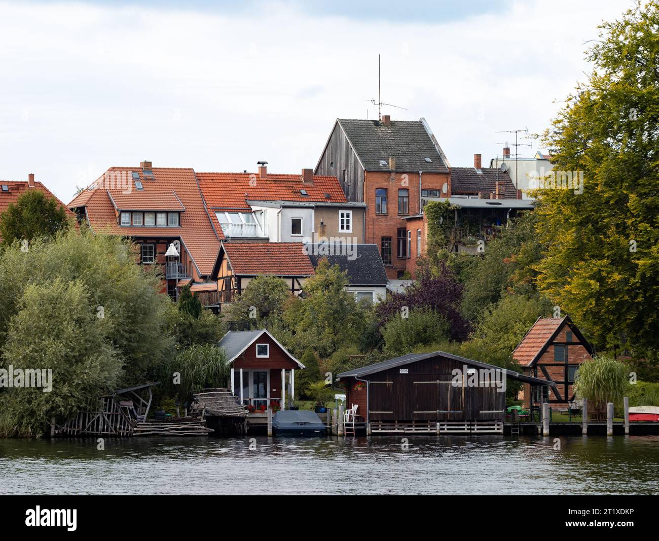 Buildings in Malchow next to the lake. The old architecture is an ...