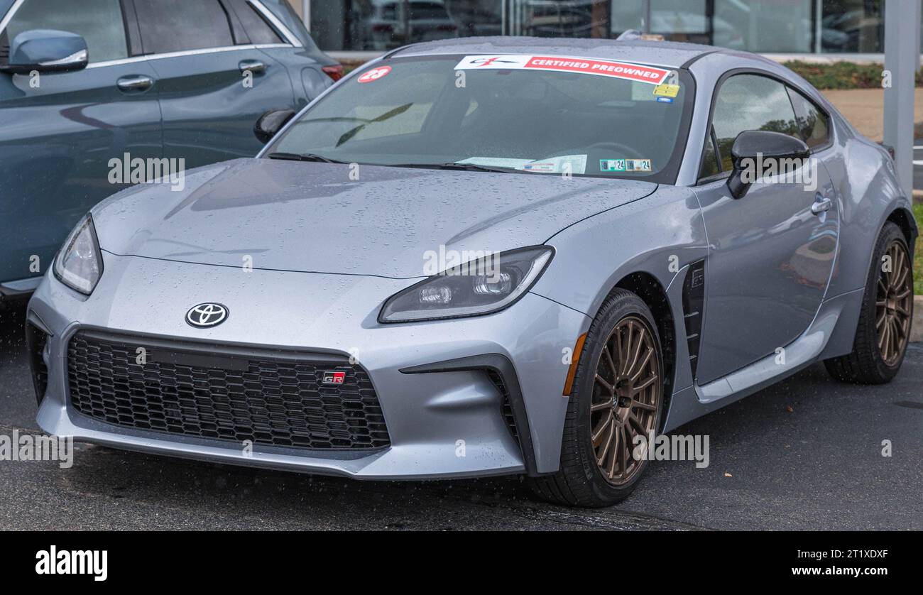 A used, silver Toyota GR86 coupe for sale at a dealership in