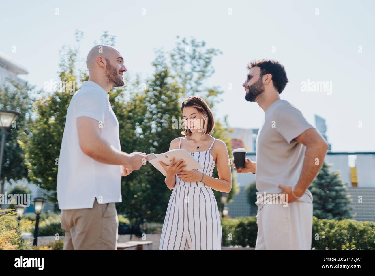 Successful Architects Collaborating on Urban Construction Project Stock Photo