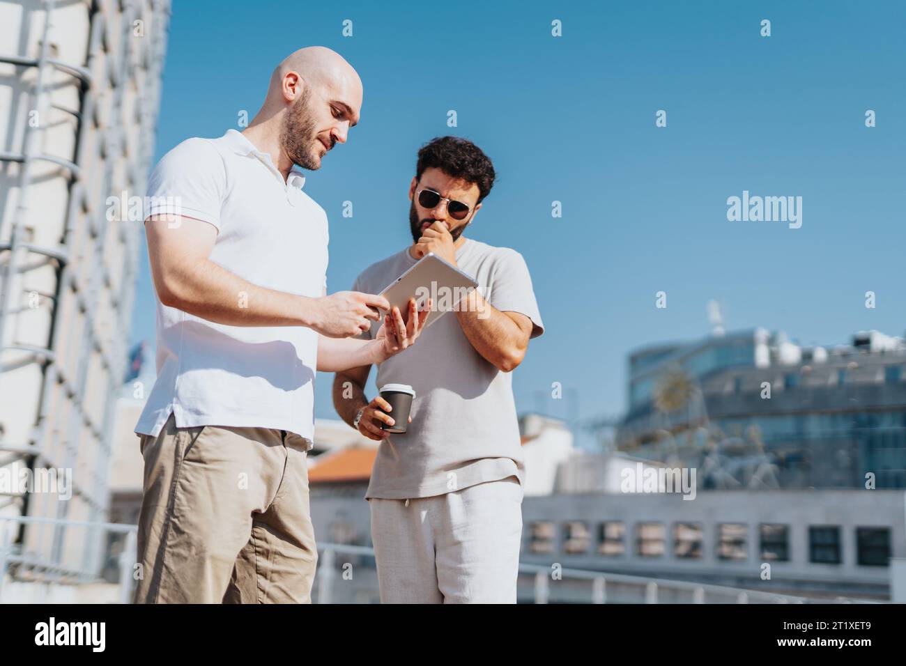 Successful Urban Architects Collaborating on Modern Infrastructure Project Stock Photo