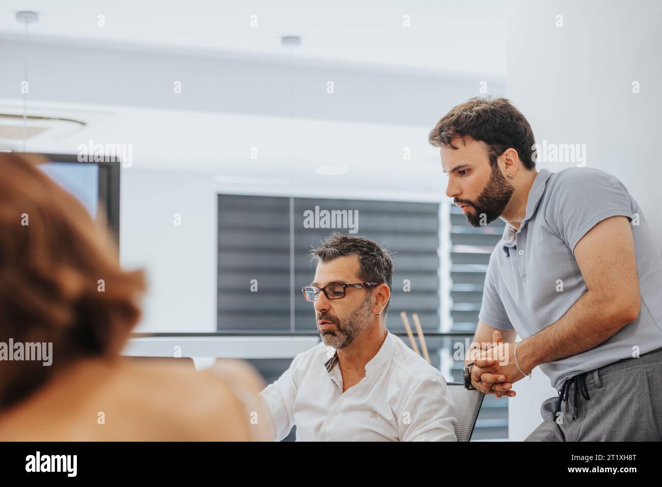 Efficient Business Partners Analyzing Reports for Profitable Growth Stock Photo