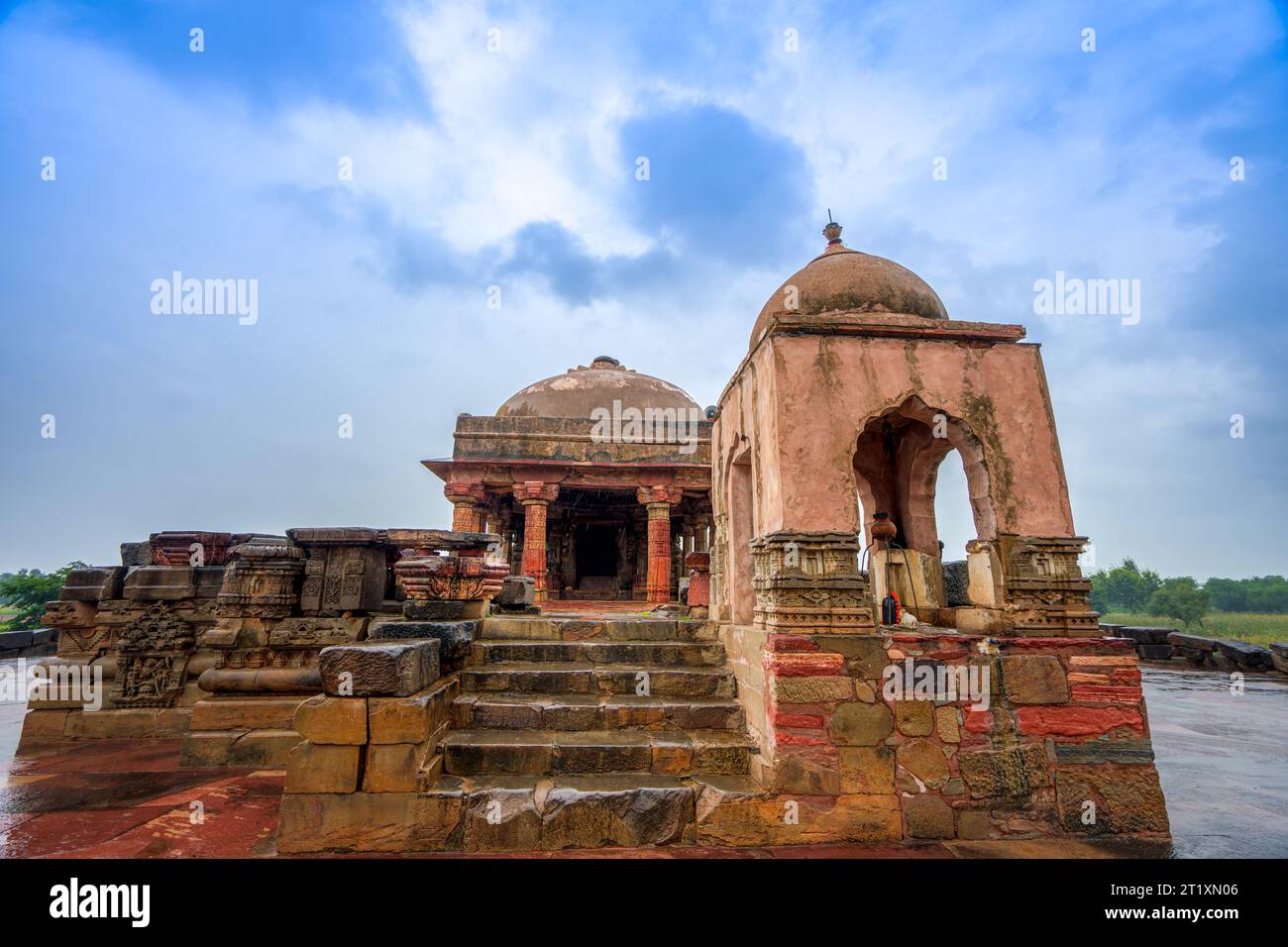 Adjacent to the Baori is the beautifully sculpted Harshat Mata temple ...