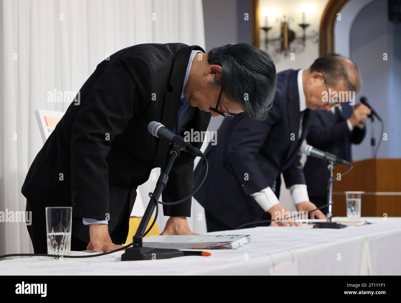Nobuo Okamura (R) procurator general of the Family Federation for