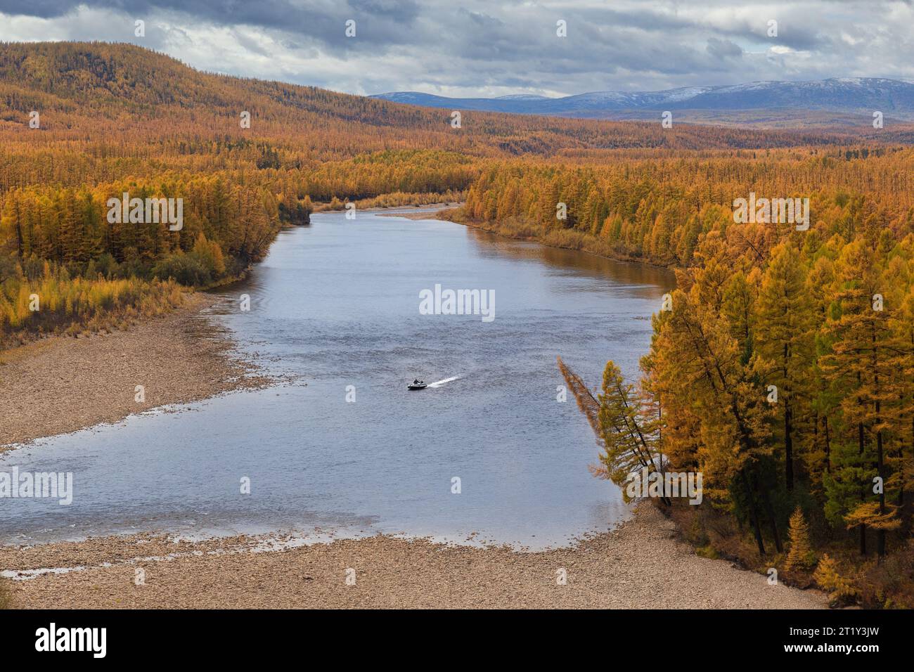 Autumn boat trip on the Chulman River in South Yakutia, Russia Stock Photo