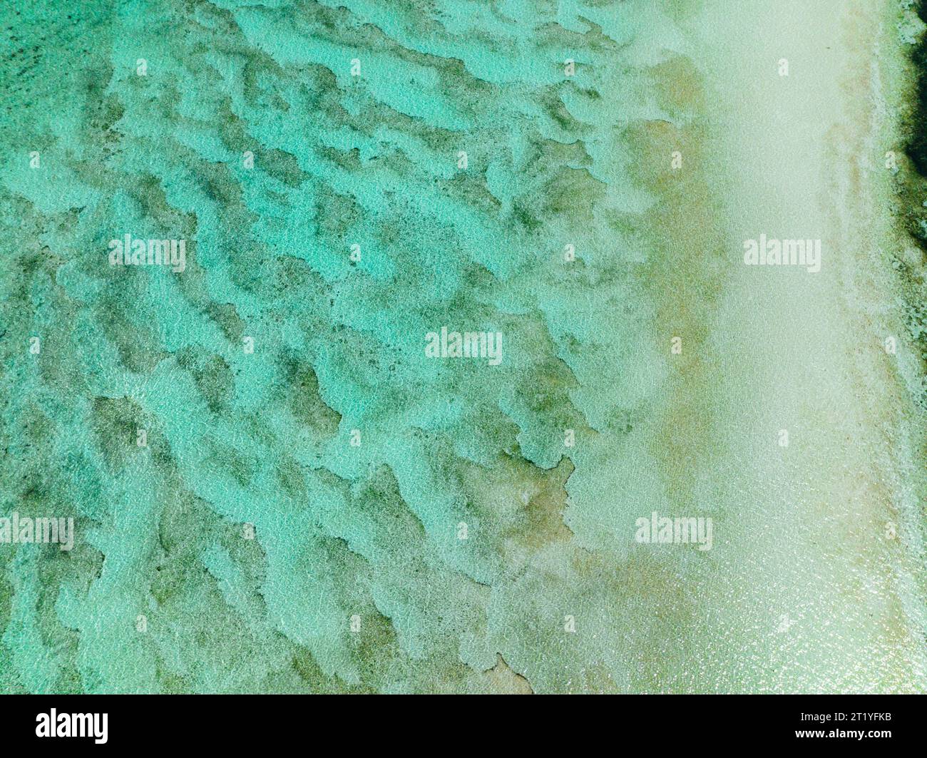 Top view of sandy ocean floor on sea surface in Surigao del Sur, Philippines. Stock Photo