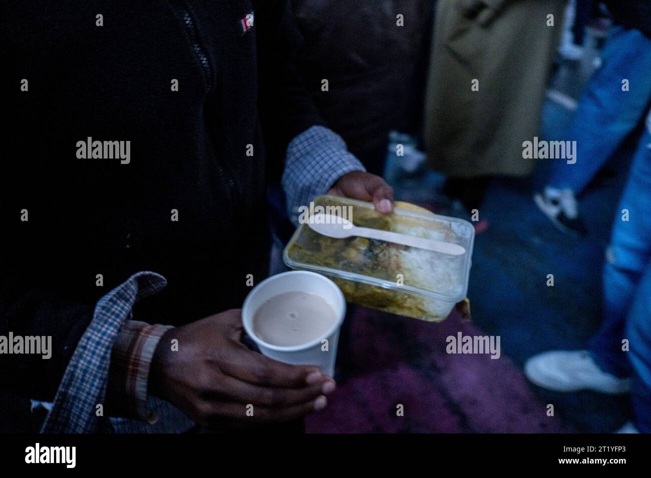 Paris, France. 15th Oct, 2023. Michael Bunel/Le Pictorium - Food distribution under the La Chapelle metro station - 15/10/2023 - France/France/Paris - Food distribution under the La Chapelle metro station organized by various associations and NGOs (Utopia 56, MDM, tendre la main, paris exil, la chorba, solidarite migrant wilson .). For the past week, a prefectoral decree has prohibited food aid for refugees, migrants and exiles in several streets in northern Paris. October 15, 2023. Paris, France. Credit: LE PICTORIUM/Alamy Live News Stock Photo