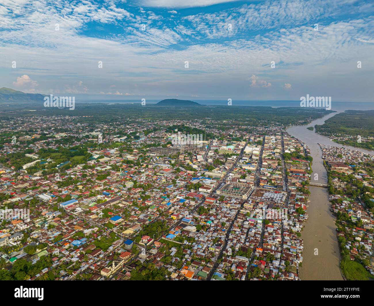 Top view of town district and rainforest in Cotabato City. River along the neighborhood. Mindanao, Philippines. Stock Photo