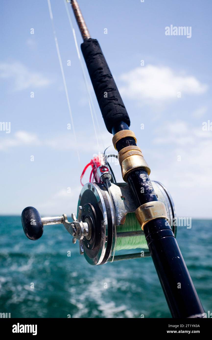 Trolling rods and reels used for offshore and deep sea fishing near Port  Aransas Texas Stock Photo - Alamy