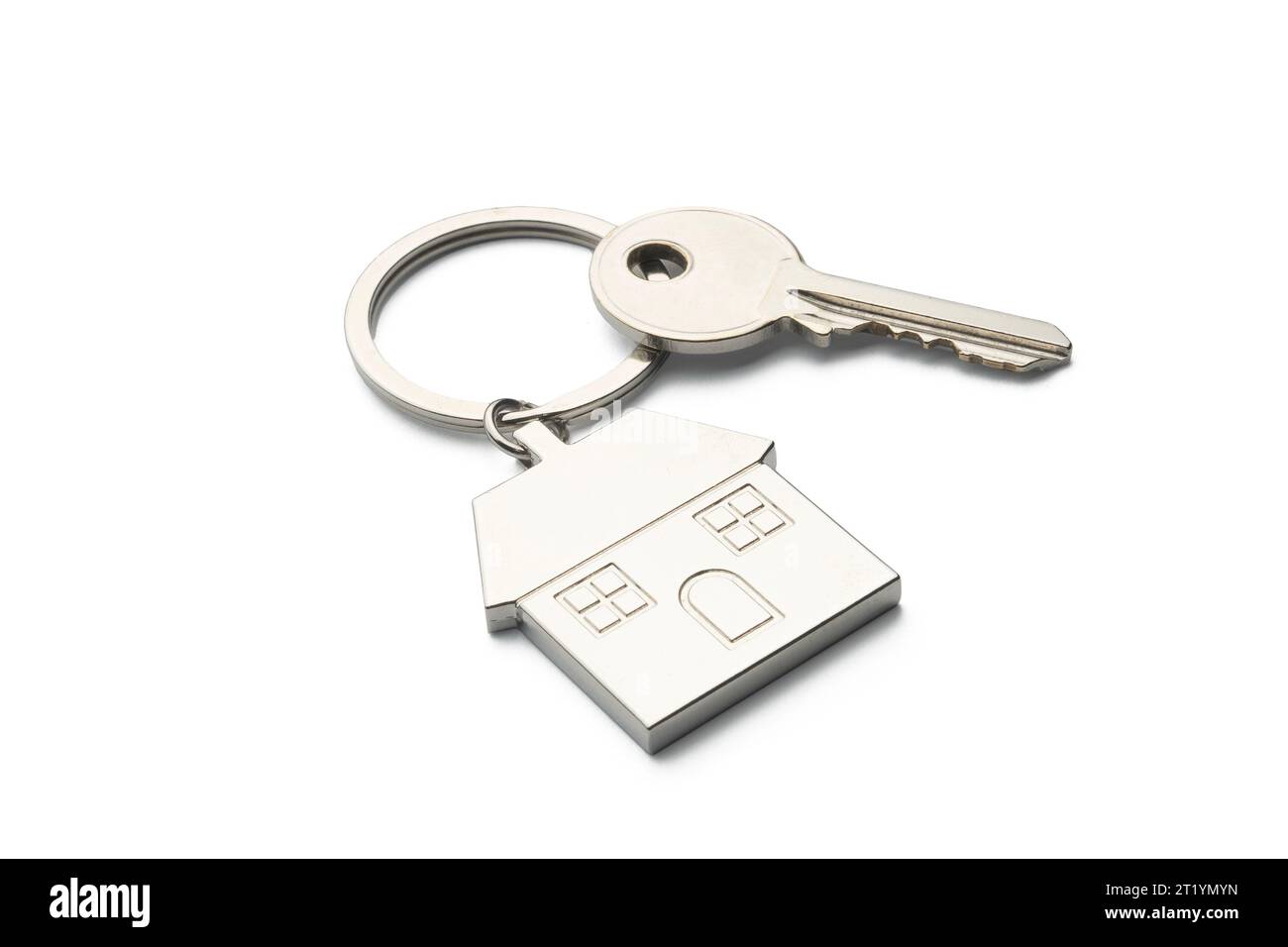Buying a house concept: house shaped keychain isolated on white background Stock Photo