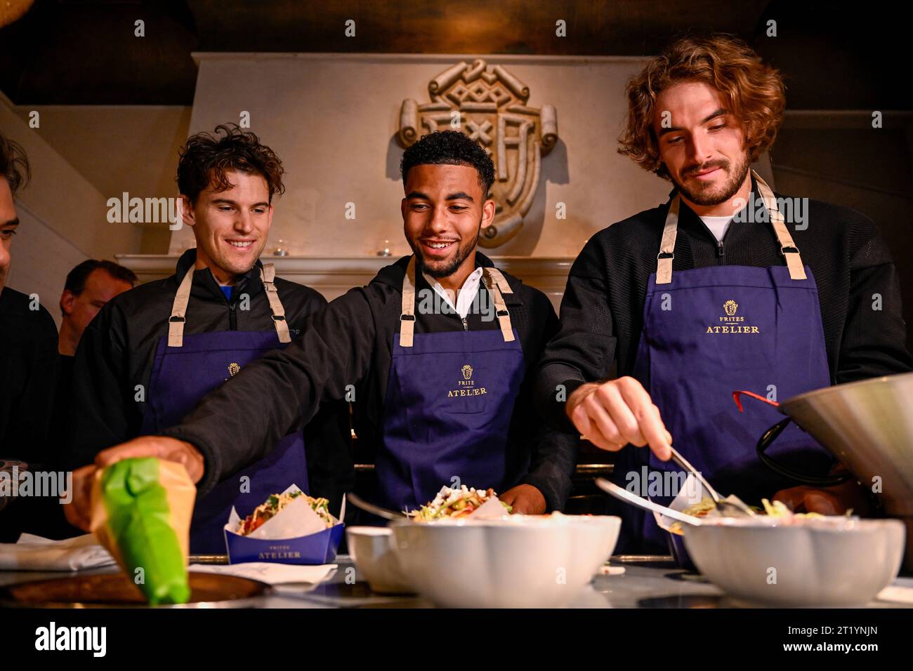 Austrian Dominic Thiem, French Arthur Fils and Greek Stefanos Tsitsipas pictured during the media day of the European Open Tennis ATP tournament, at the 'Frites Atelier of Sergio Herman', in Antwerp, Monday 16 October 2023. BELGA PHOTO LAURIE DIEFFEMBACQ Stock Photo