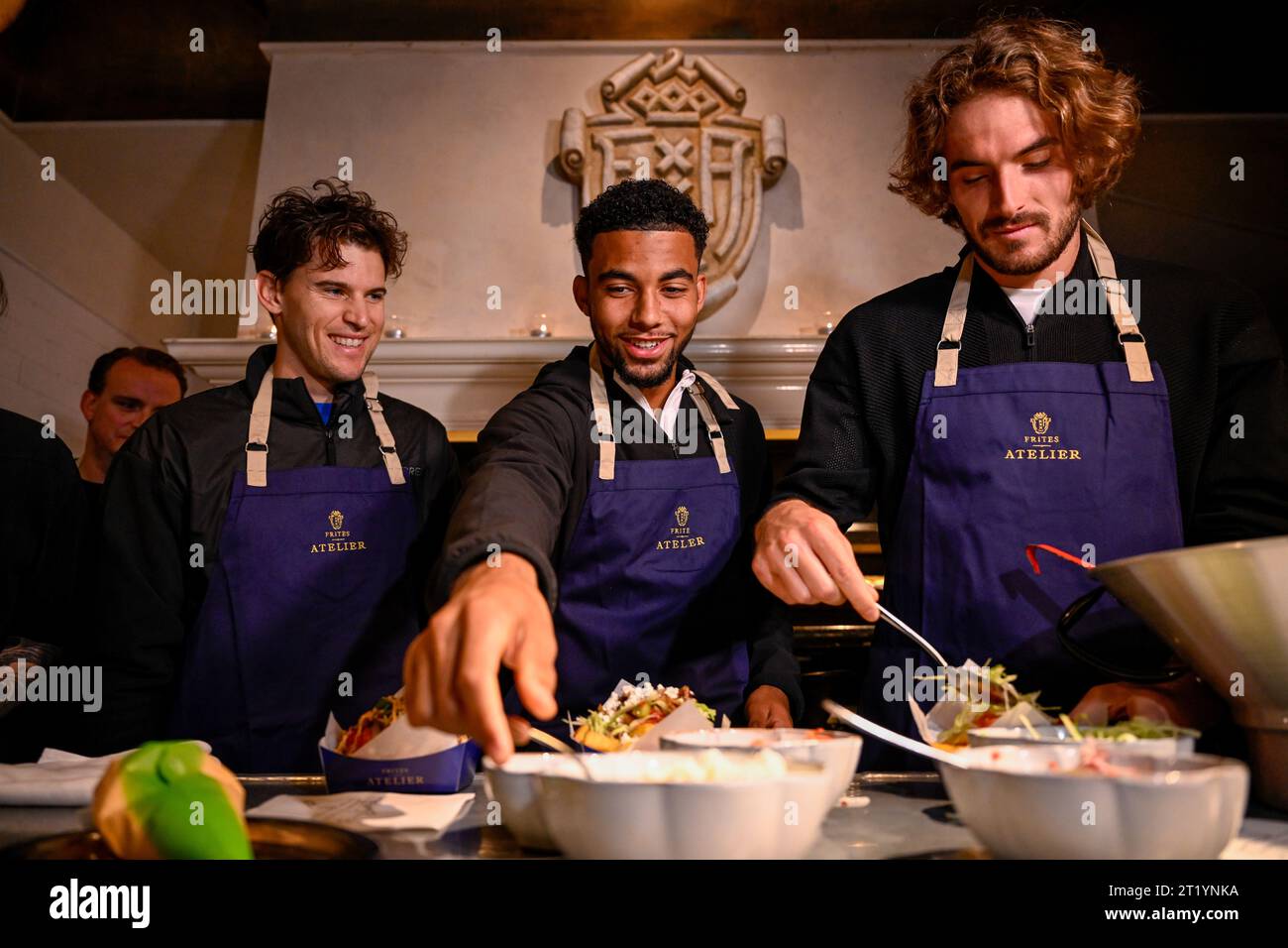 Austrian Dominic Thiem, French Arthur Fils and Greek Stefanos Tsitsipas pictured during the media day of the European Open Tennis ATP tournament, at the 'Frites Atelier of Sergio Herman', in Antwerp, Monday 16 October 2023. BELGA PHOTO LAURIE DIEFFEMBACQ Stock Photo