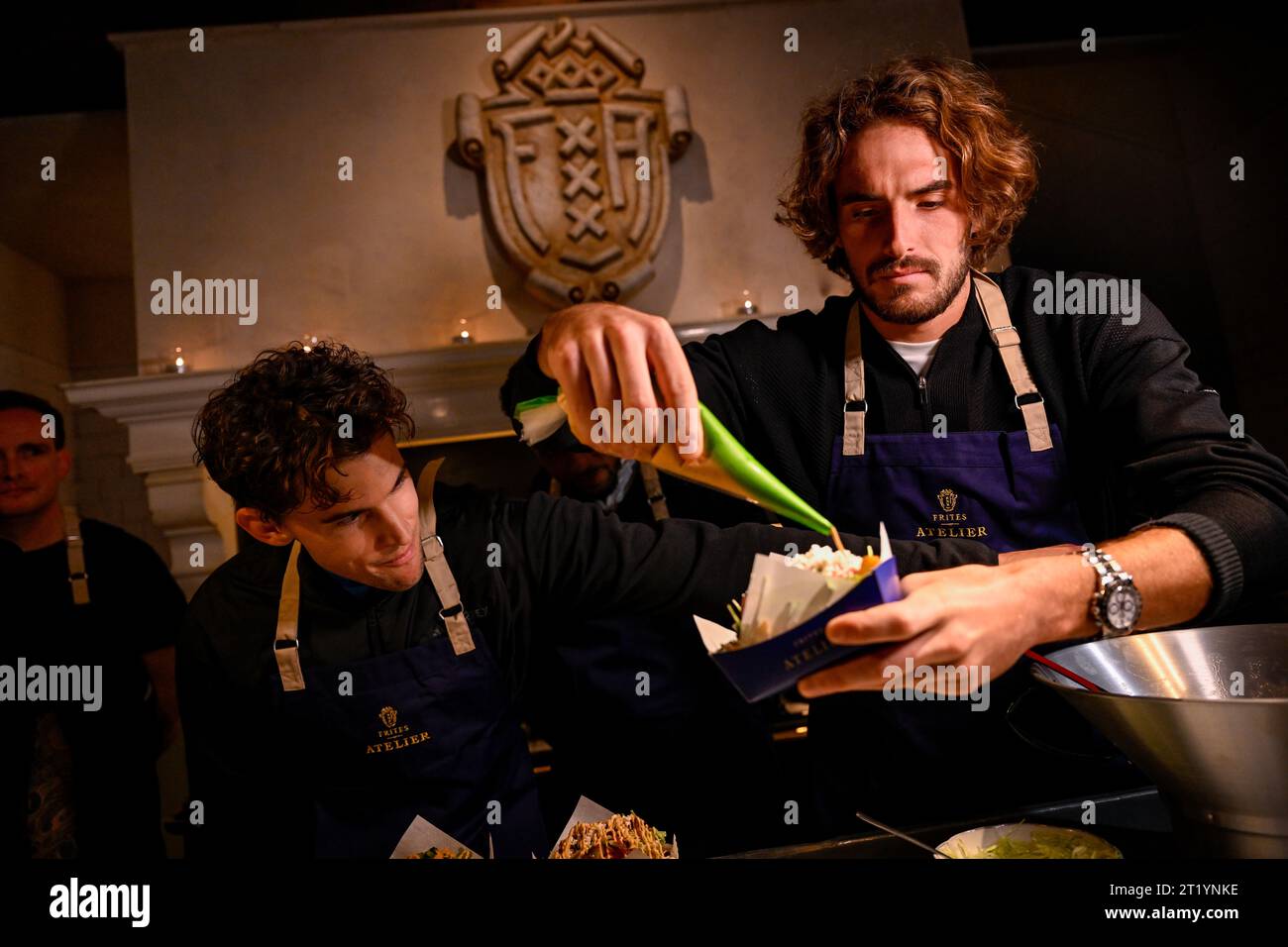 Austrian Dominic Thiem, French Arthur Fils and Greek Stefanos Tsitsipas pictured during the media day of the European Open Tennis ATP tournament, at the 'Frites Atelier of Sergio Herman', in Antwerp, Monday 16 October 2023. BELGA PHOTO LAURIE DIEFFEMBACQ Stock Photo