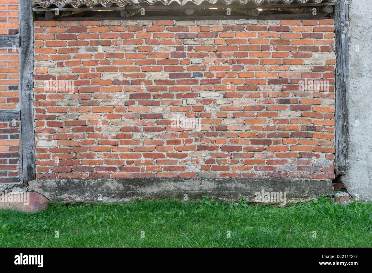Background with wall made of red bricks Stock Photo