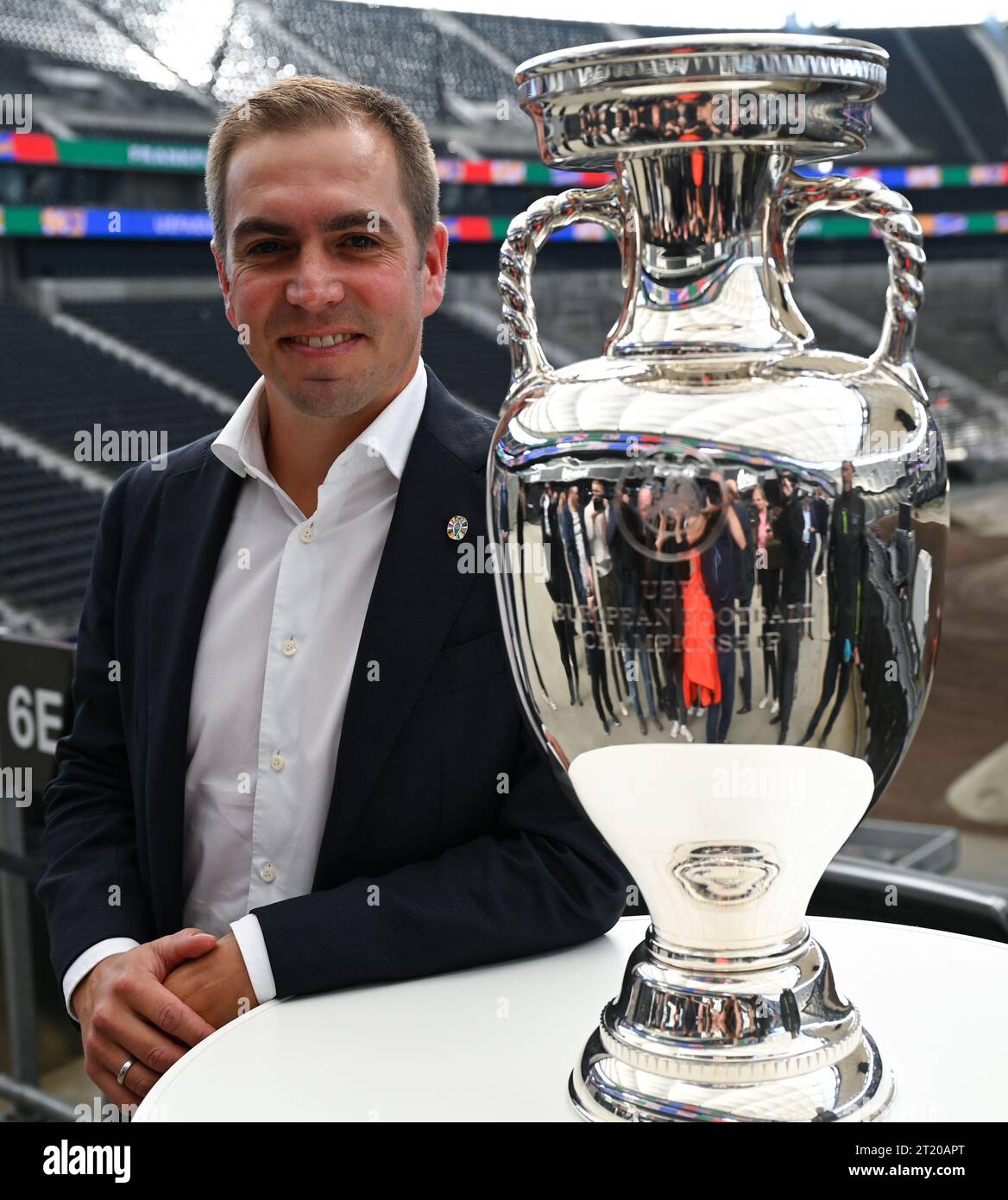 Frankfurt, Germany. October 16, 2023. Philipp Lahm, tournament director of UEFA EURO 2024, stands next to the European Championship trophy following a press conference on EURO 2024 at the Frankfurt stadium. Photo: Arne Dedert/dpa/Alamy Live News Stock Photo