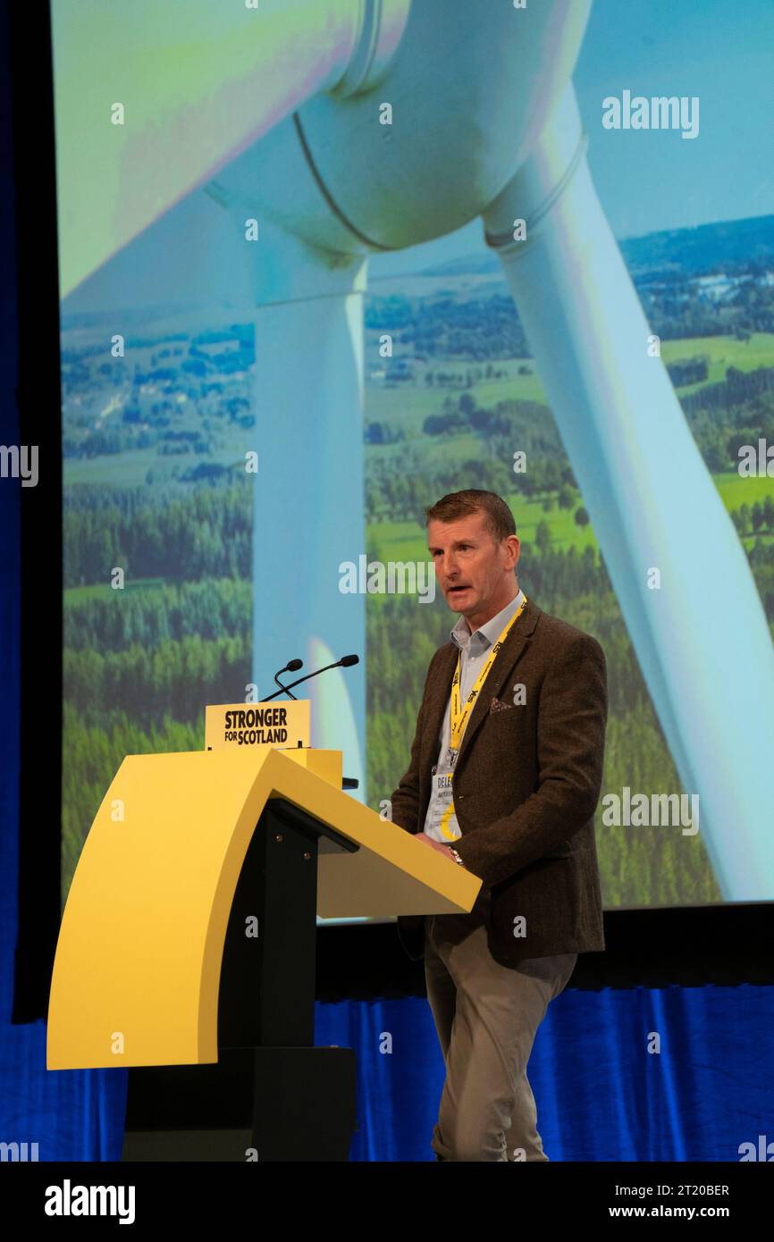 Aberdeen, Scotland, UK. 16th October 2023.  Day two at the SNP annual conference held at P and J Live conference centre in Aberdeen. Speaker Dave Doogan MP speaks on SNP wind turbine planning policy.  Iain Masterton/Alamy Live News Stock Photo