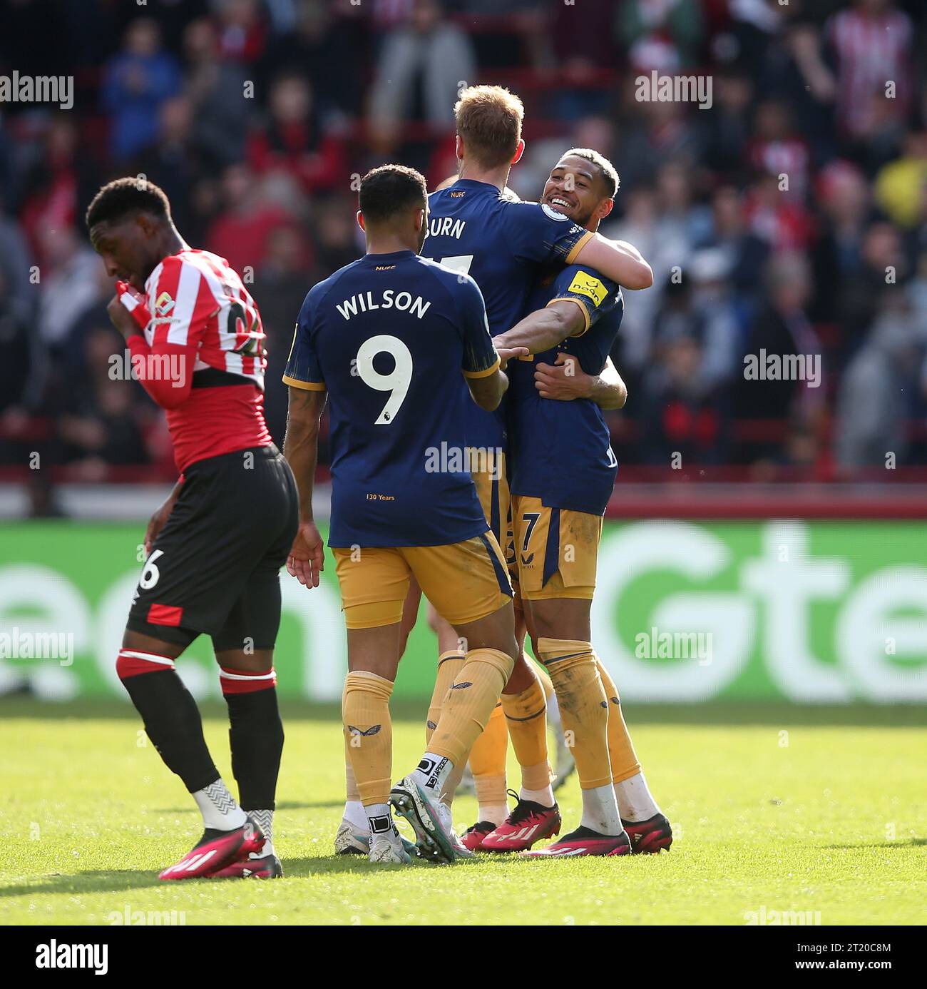 Joelinton of Newcastle United celebrates the victory with Dan Burn ...