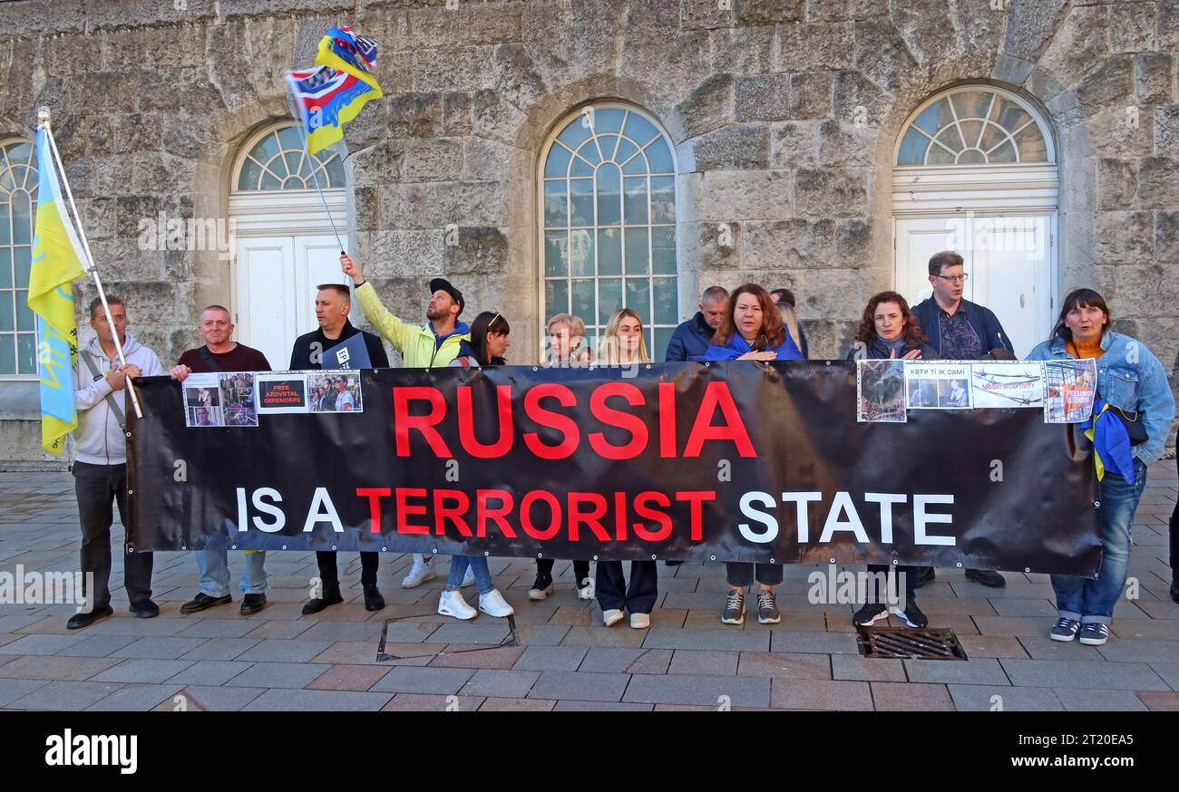 Russia Is a Terrorist State - Ukrainians in Birmingham city centre to protest the invasion of Ukraine by Putin of Russia, Victoria Square Stock Photo
